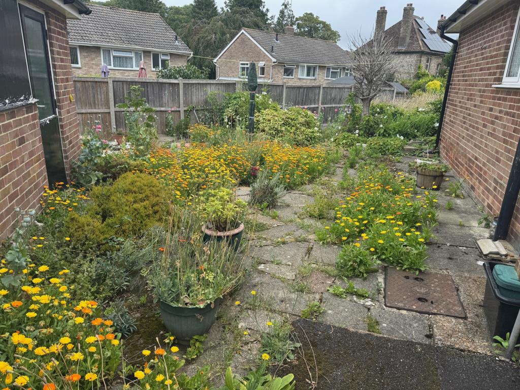 Lot: 132 - SEMI-DETACHED THREE-BEDROOM BUNGALOW FOR REFURBISHMENT WITH GARAGE - Side Garden